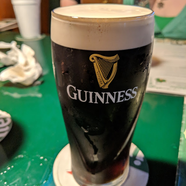 A freshly poured pint of Guinness on tap
